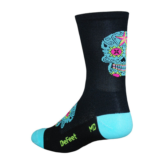 black cycling sock with turquoise heel and toe and turquoise and pink sugar skull on the cuff and foot